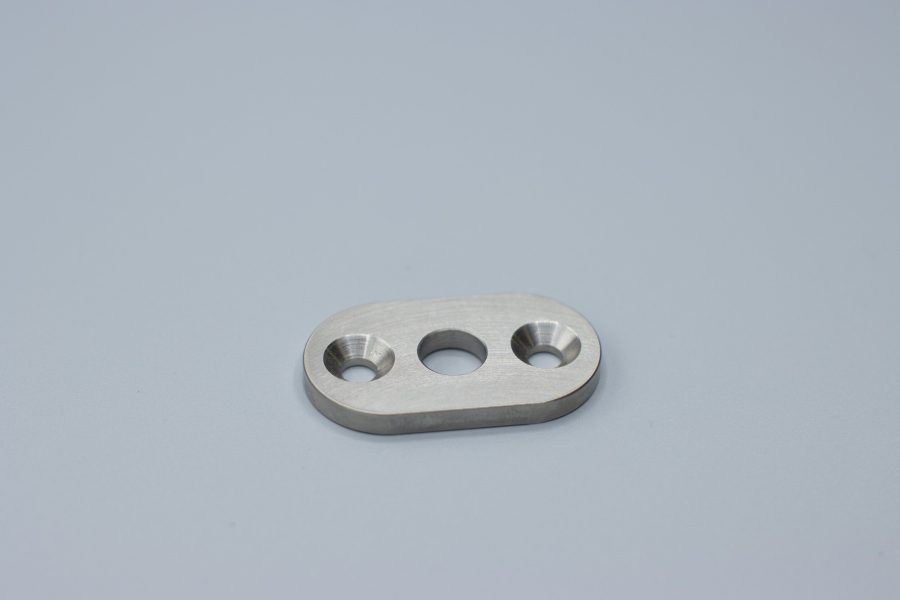 Milled plate with pocketed features